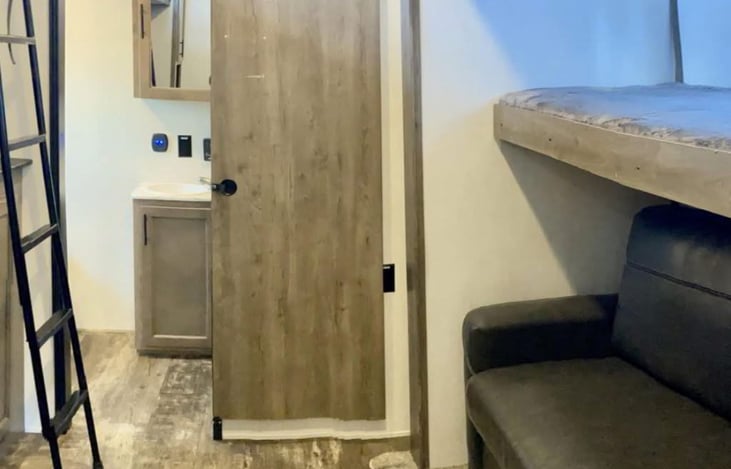 Bunk house with pull out couch folded in.