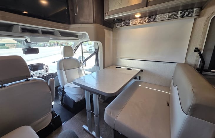 Seat belts in both couches and with the shade up, everyone has a great view.