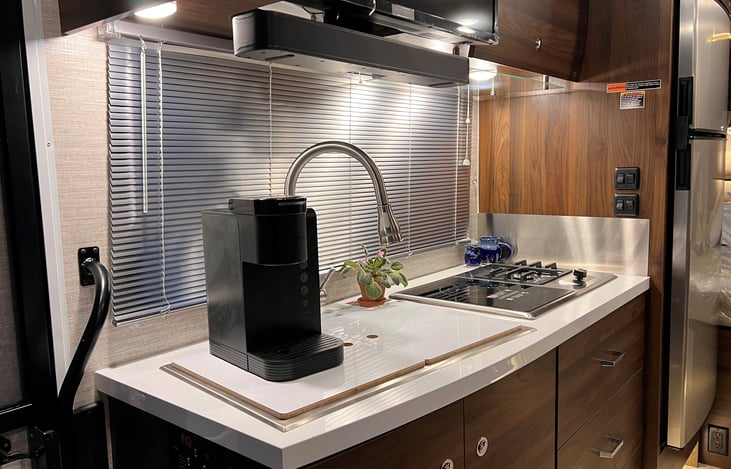 Generous kitchen area.  Induction and/or gas options on range.