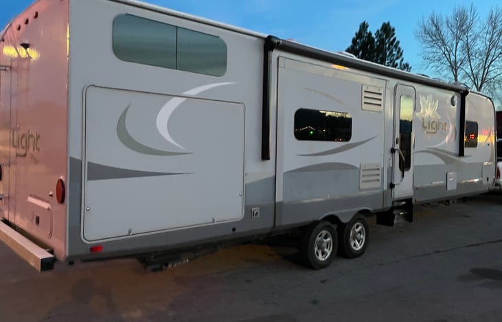 Triple slide with motorized awning