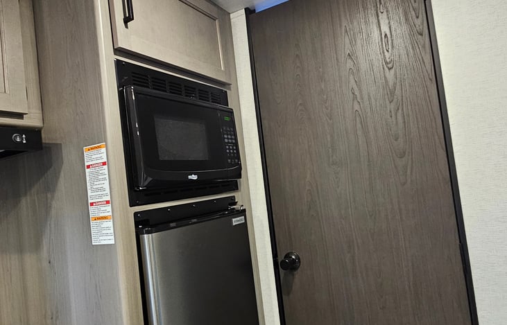 Microwave and Fridge.