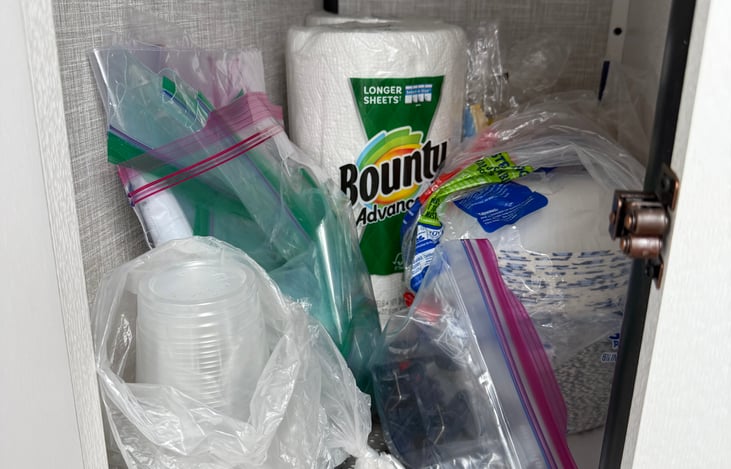 Various size zip lock bags, plastic cups, small paper plates, paper bowls and paper towels.
