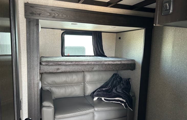 Trifold Sofa and bunk in private room