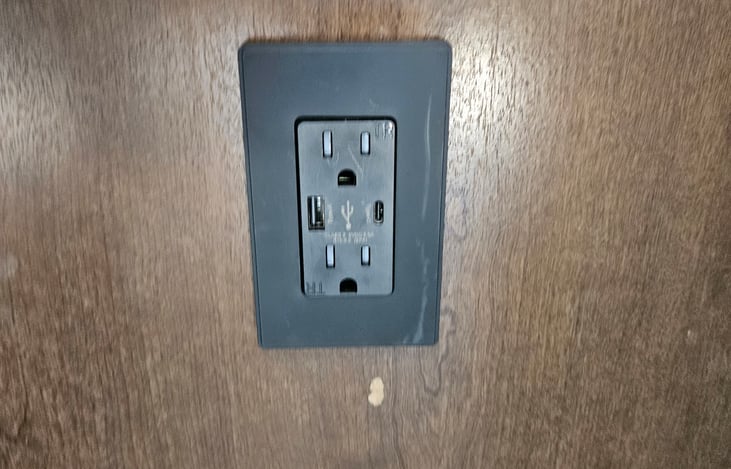 Plugs on both sides of queen bed have been upgraded to have a regular and mini USB adapter