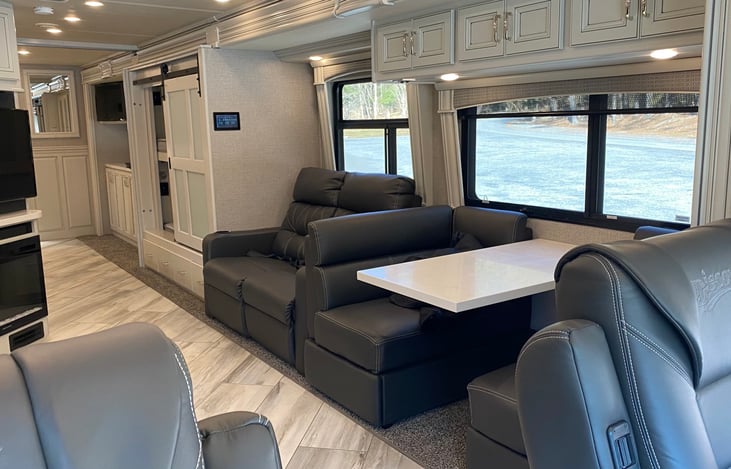 Dinette area and entertainment chairs that recline.