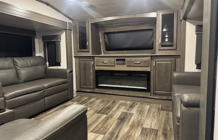 Living room with TV hidden inside.