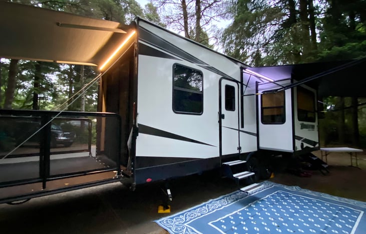 Rear deck patio living expands the indoors into the outdoors.