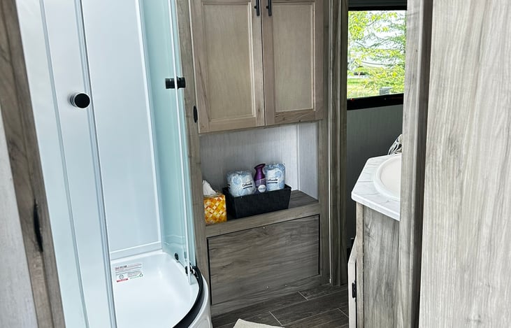 Stocked bathroom with a sunroom!  Just bring your personal items!