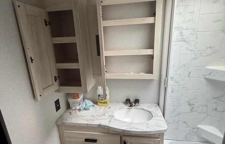 Storage cabinets above the sink