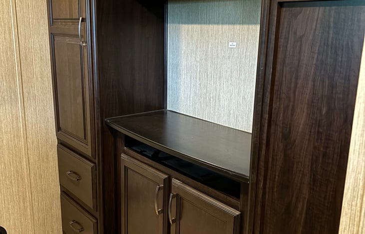 A TV HAS BEEN ADDED SINCE THIS PHOTO WAS TAKEN. 
Bunk room beside the kitchen has a top bunk for 1 and a sleeper sofa for 2, with lots of storage for all their needs.