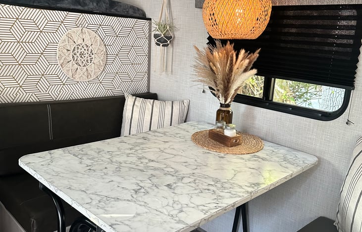 table with controllable lighting, bright or dark window.