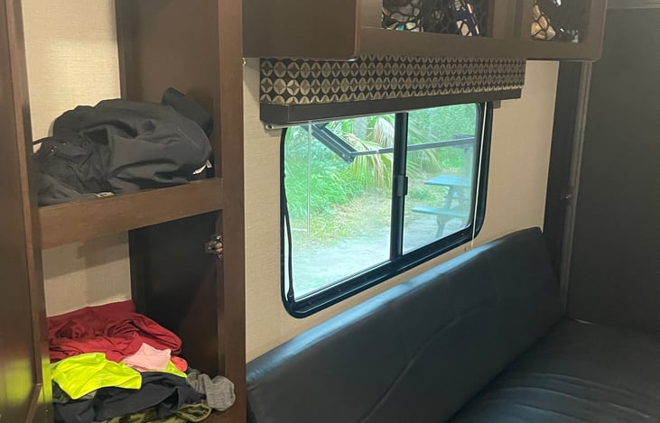 more storage over the couch and to the side.