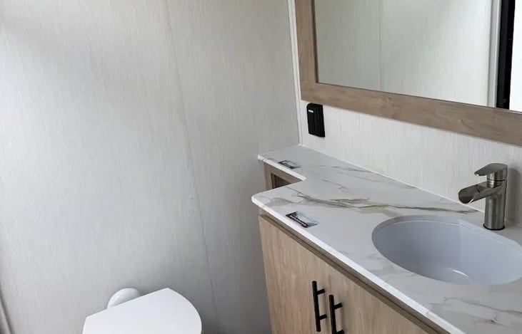 Bathroom with shower and toilet.