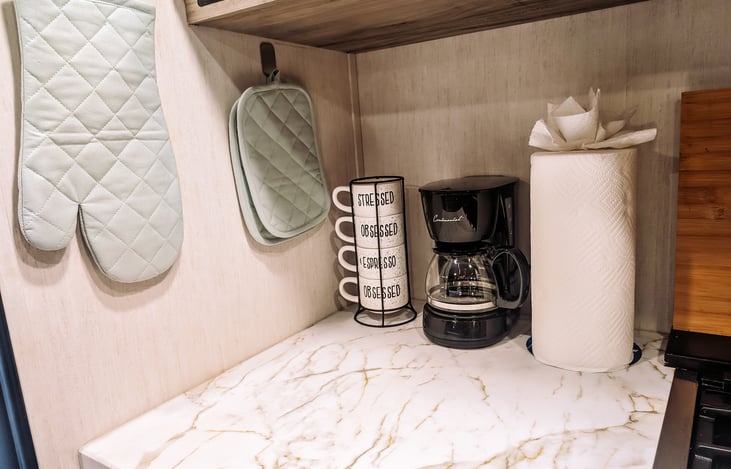 Additional counter space, great for a coffee bar.