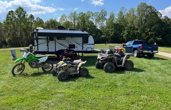 ATV camping.  All three of these fit on the toy hauler deck. (ATVs not included.)