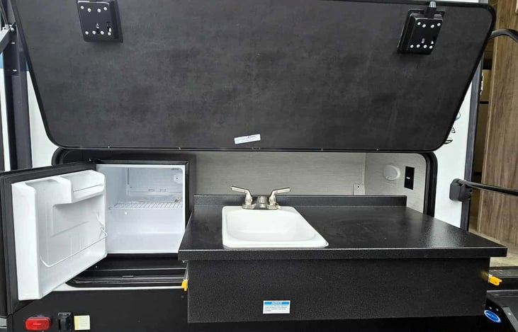 pull-out outside beverage fridge and sink