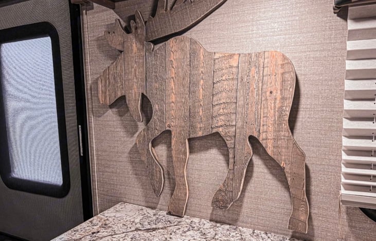 the moose will greet you as soon as you enter the door. our one dog is named moose, so we decided to name this unit after him.