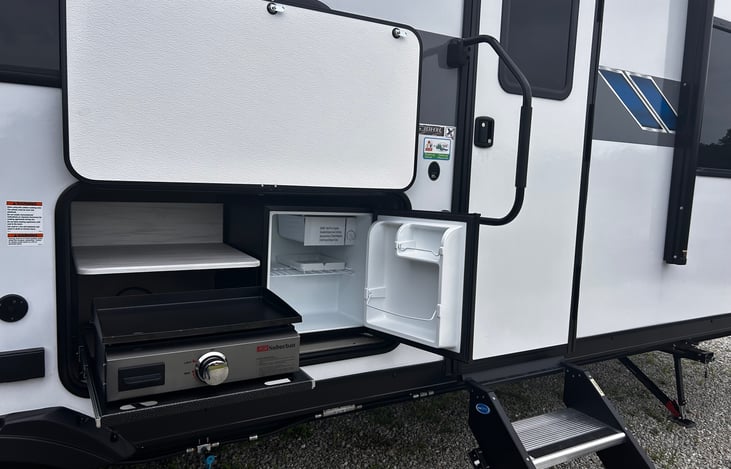 Outdoor refrigerator and griddle for the  perfect breakfast omelet or a shady place to sear steak.