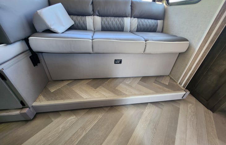 Sofa with storage underneath.