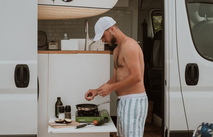 With a folding table, you can cook meals outside on a sunny day.