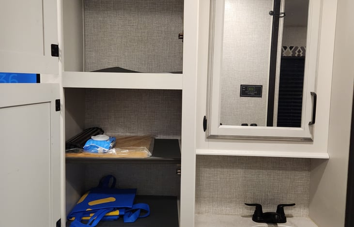 Bathroom vanity + additional wardrobe/storage space