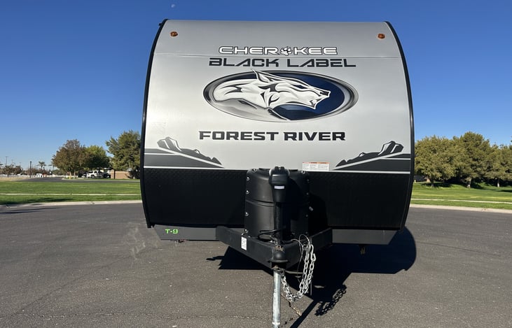 Front cap and hitch area for tow setup and arrival orientation.