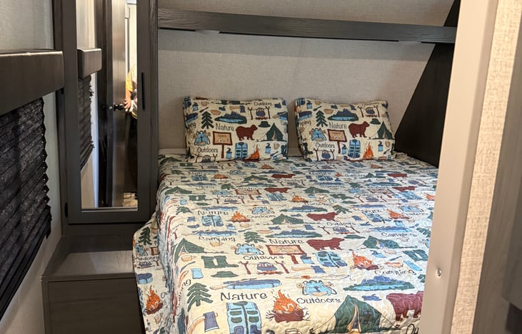 Private master bedroom with a normal queen size memory foam mattress. There is a closet on each side. Bathroom located near foot of the bed. Bedroom has a door to outside.