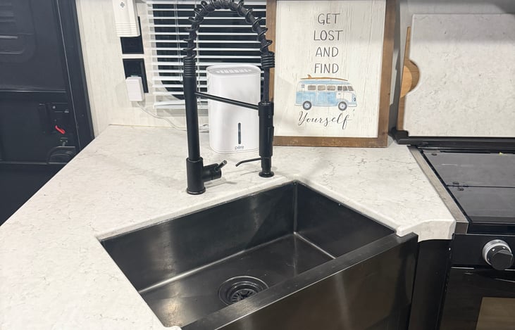 Large farmhouse kitchen sink.