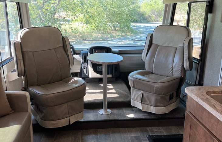 Captains chairs set up with table