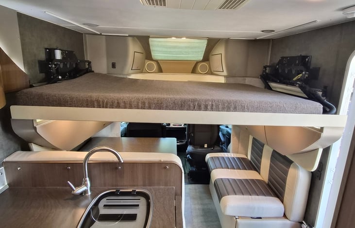 59x87 and below samesize with dinnette and bench turns into huge bed