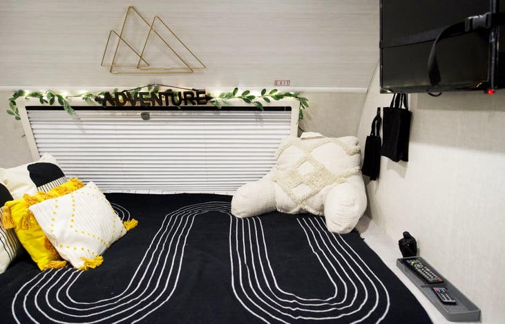 Hanging bags, containers provide extra storage to keep your keys, cells phones etc. organized. USB chargers/outlets to charge electronics. *Back/throw pillows/blanket available for FREE upon request.