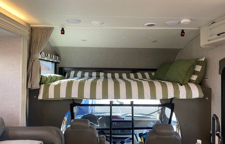 Above cab bunk. Super spacious.