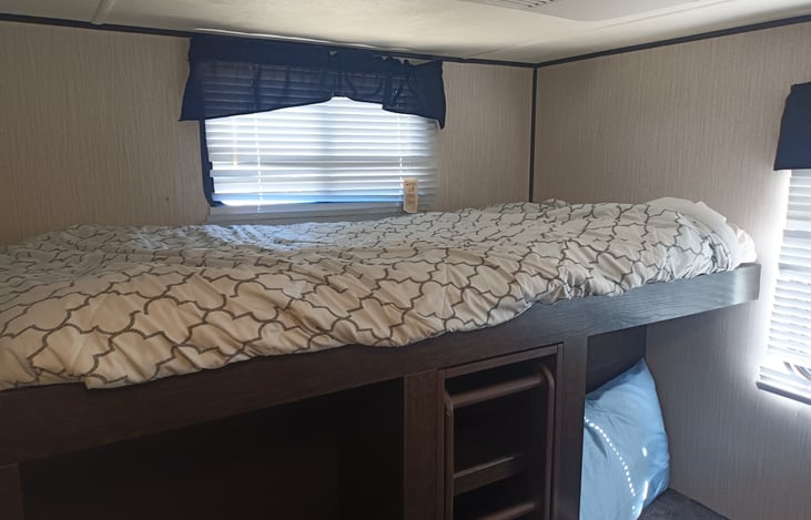 Back bedroom ... 1 of the 3 fixed twin beds with ladder