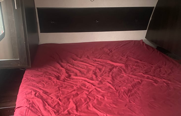 Master bedroom  front of RV queen size bed.