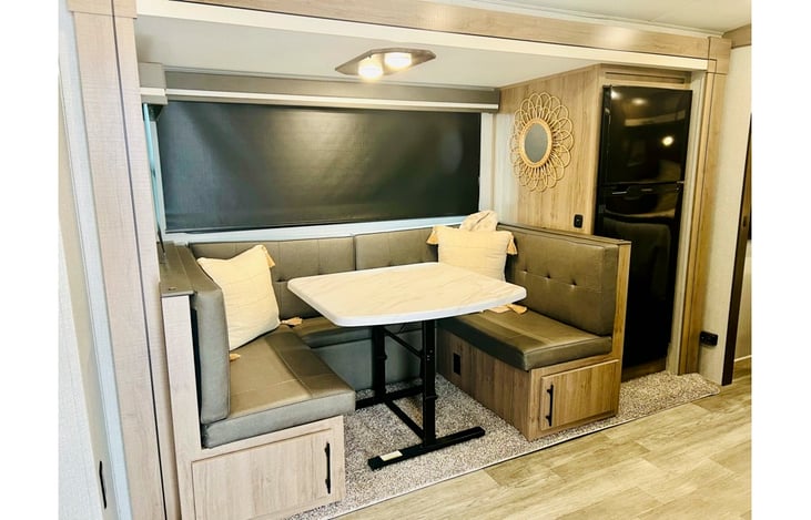 Slide out Dinette converts to a full size bed.