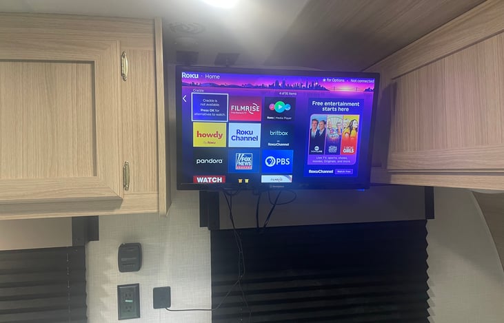 TV with Roku. There is an co-axil cable port on the outside for cable if it is available where you are.