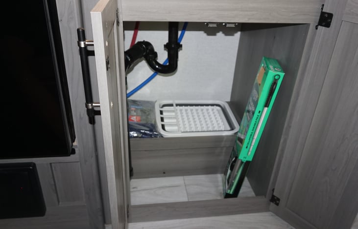 Under sink storage in kitchen space