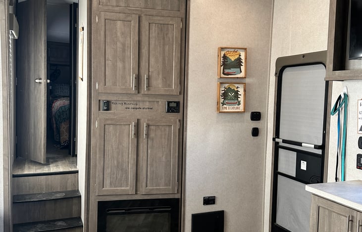 Fireplace, stairs that go up to bathroom and master bedroom