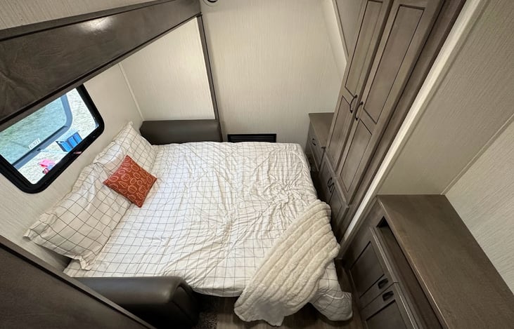 The Loveseat in the Extra Slide Room folds out into a Queen Bed (more or less)