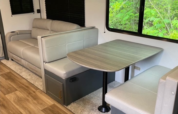 Couch and dinette can be folded down to allow for more sleeping area.