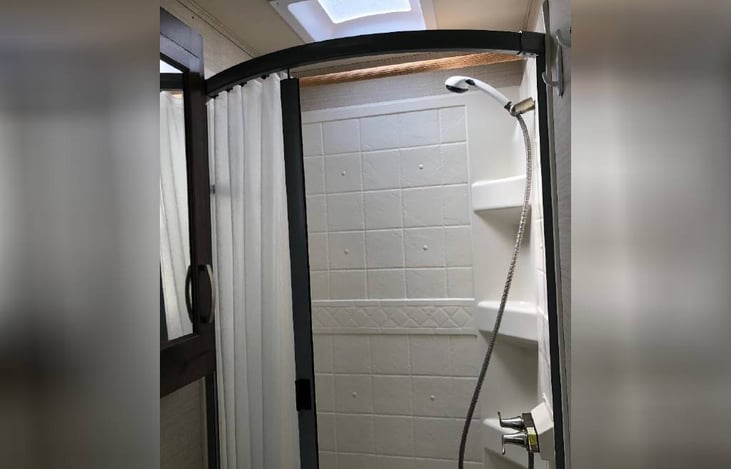 No step, walk-in shower for easy access for all ages.