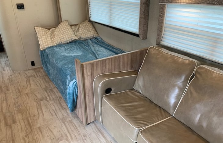 The dining table easily turns into a double bed when its time to turn in.