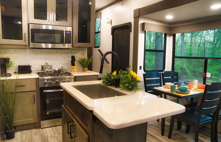 A nice size sink & enclave await for a cozy meal.