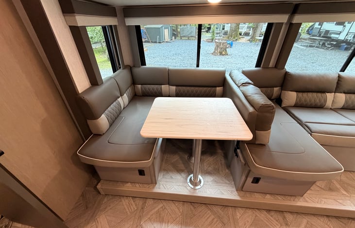 Dinette in the smaller position to allow for more couch seating. Easy to do!