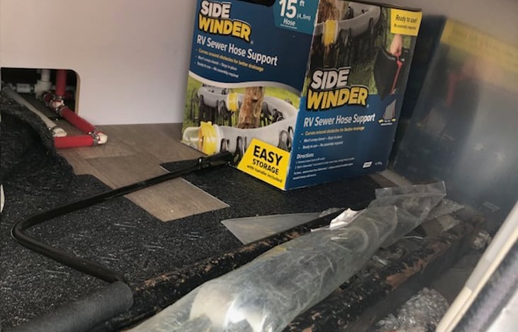 RV sewer hose support