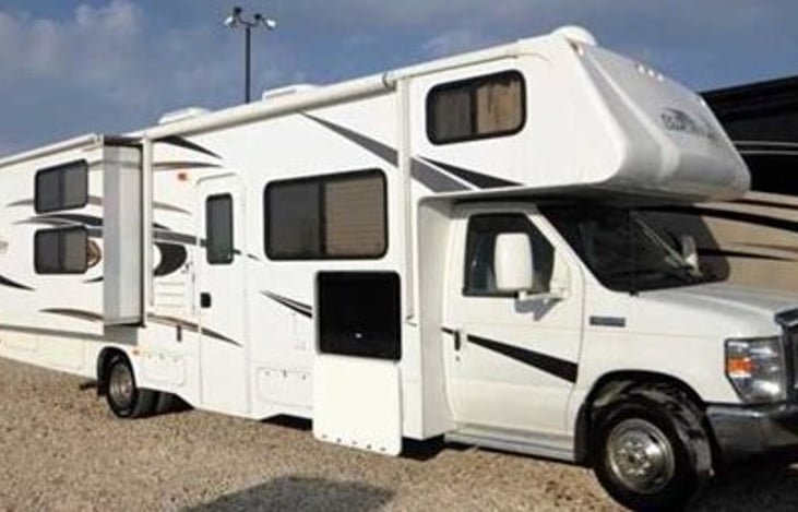 Rover's really good side - outdoor TV! Also shows rear slide is out.