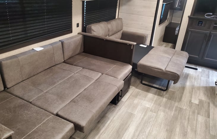 Dining table area and sofa- beds