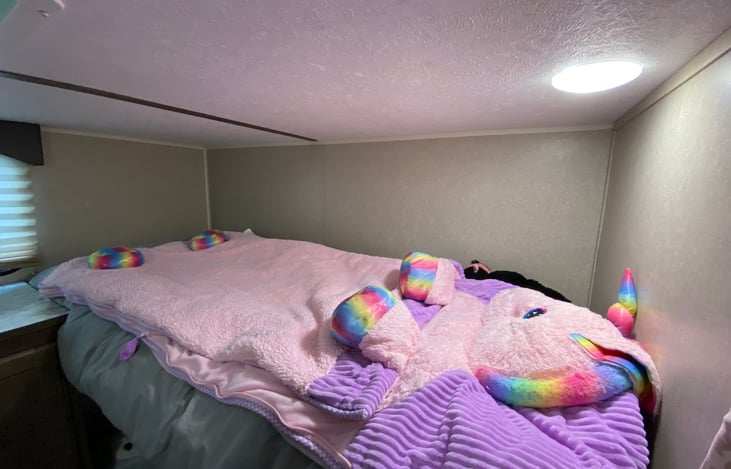 Bunkhouse: upper right bunk with button light