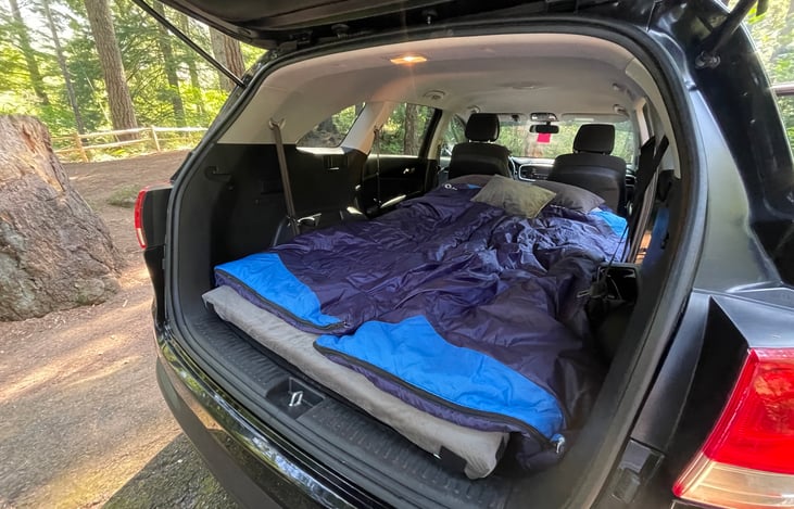 Cozy setup for 1-2 people with 3" memory foam mattress, sleeping bags and camping pillows