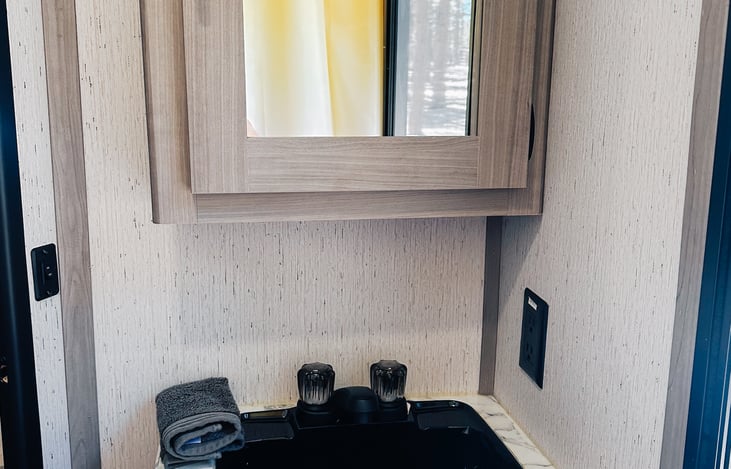 Bathroom Vanity with Medicine Cabinet that has storage